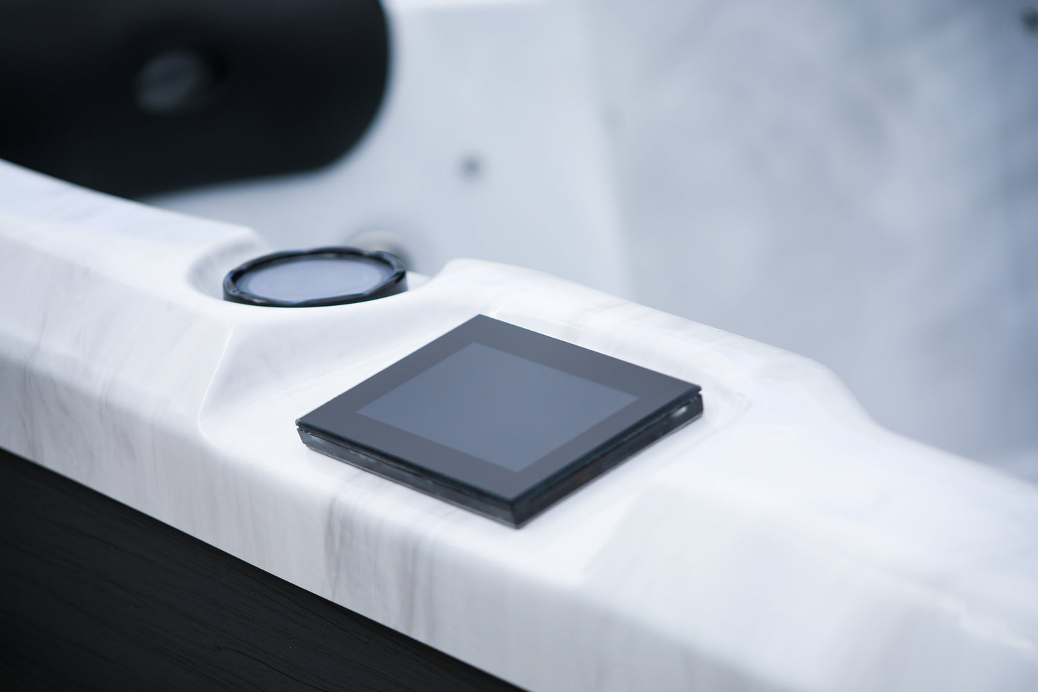 close up view of a Balboa touchscreen control on a hot tub