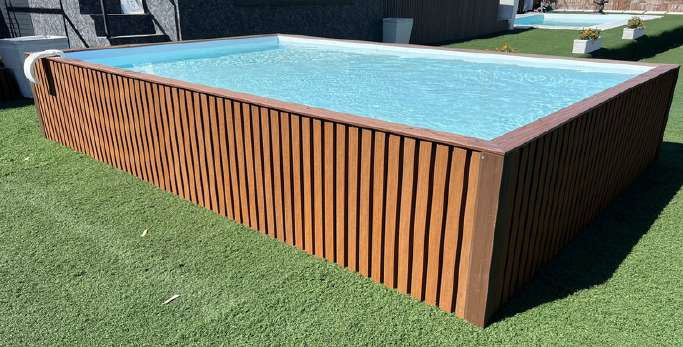 Rectangular above ground pool with artificial grass
