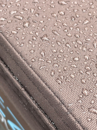 clsoe up of hot tub cover showing water droplets