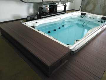Automated swim spa cover indoors