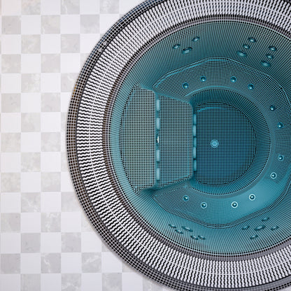 close up of a mosaic hot tub installed in ground