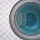 close up of a mosaic hot tub installed in ground