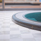 close up image of a dark mosaic hot tub 