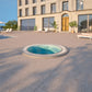 mosaic hot tub installed outside of a hotel
