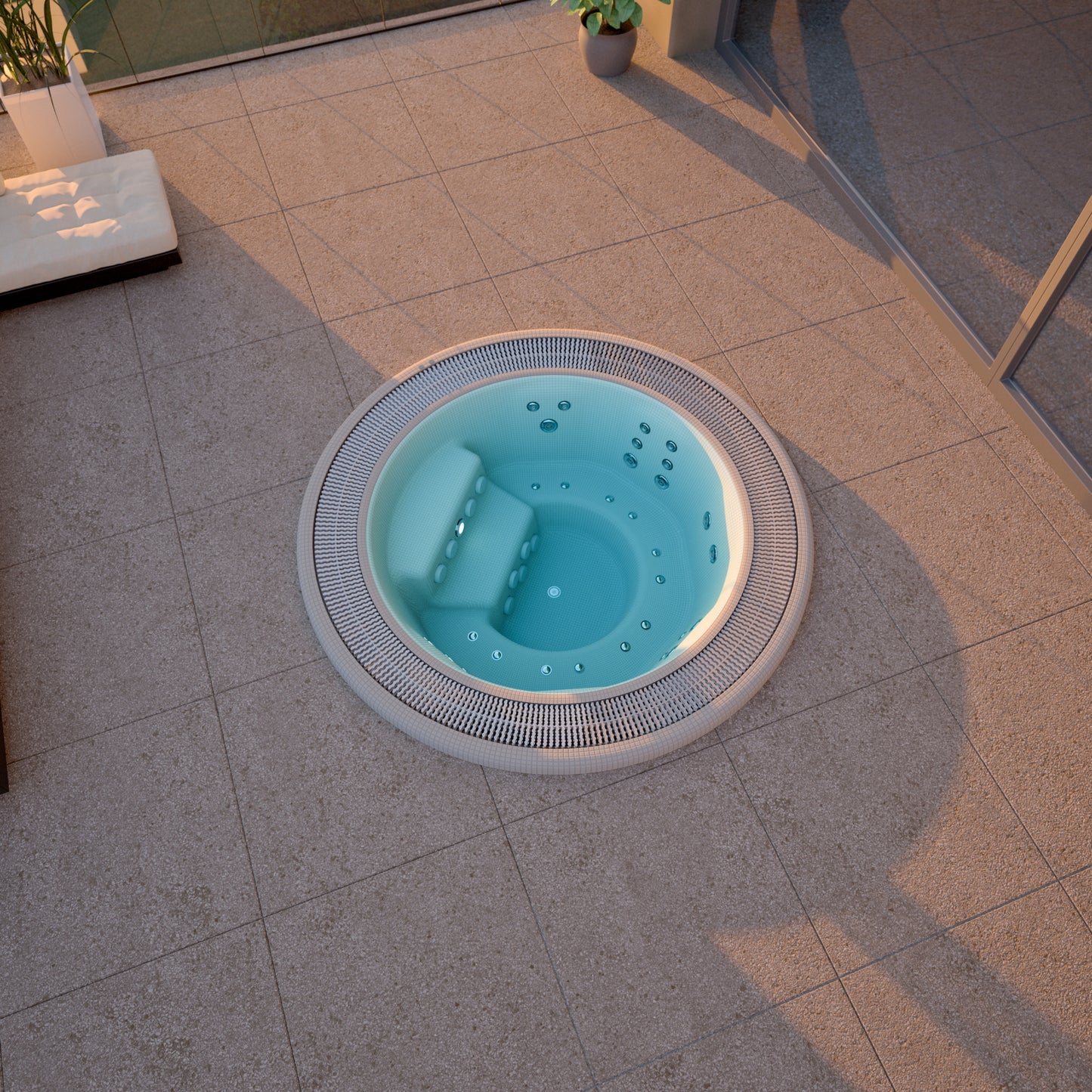 Round mosaic hot tub with blue water on a tiled patio