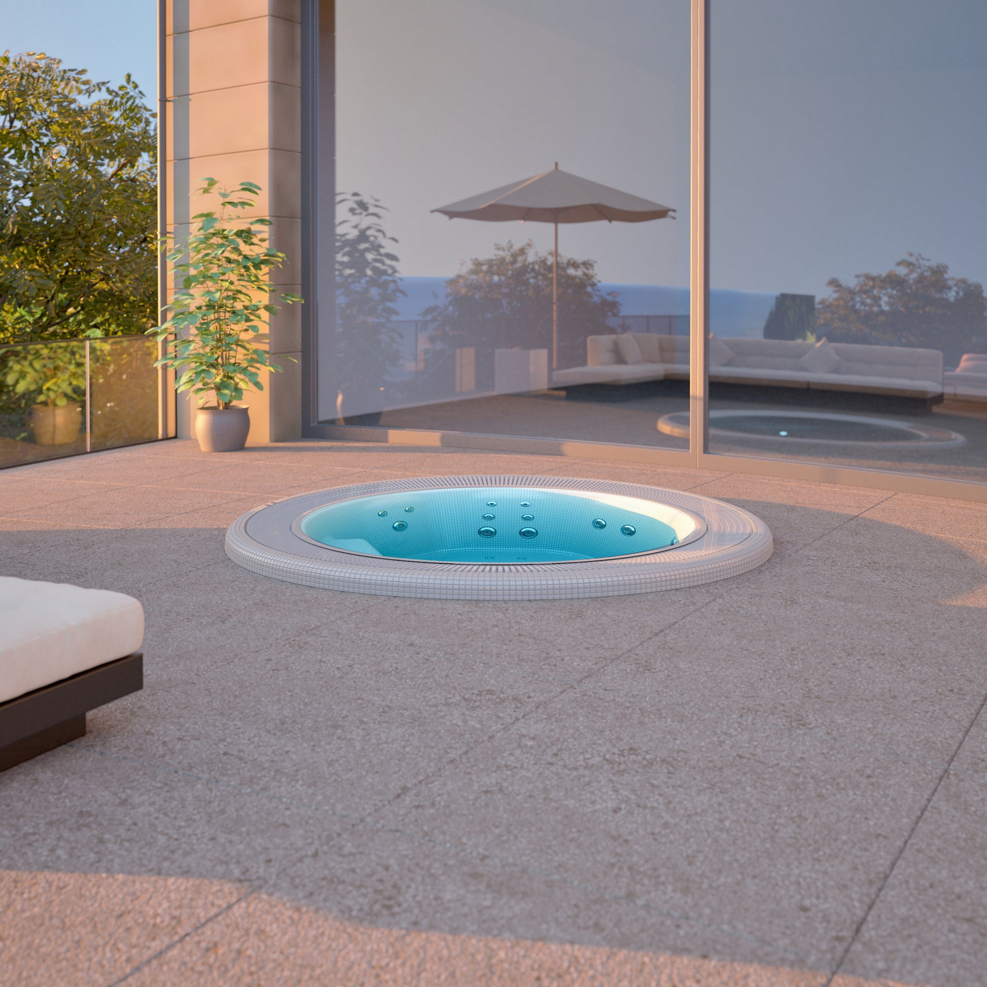 Outdoor mosaic hot tub in a modern patio setting with a view of the ocean.