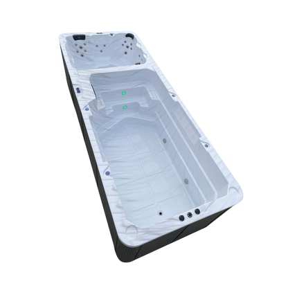Dual temperature swimspa side on view with white marble acrylic 