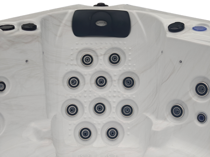 Close up of a hot tub seat with hydrotherapy jets