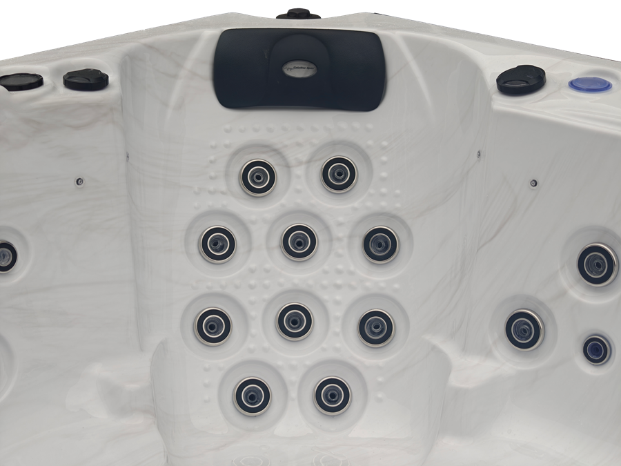 Close up of a hot tub seat with hydrotherapy jets