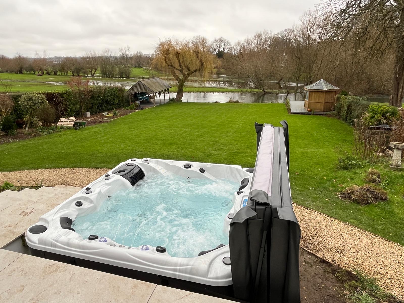 Hot Tub installed in a garden overlooking a river