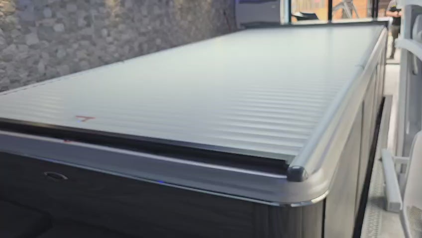 video of EZ glide automated swim spa cover opening and in use
