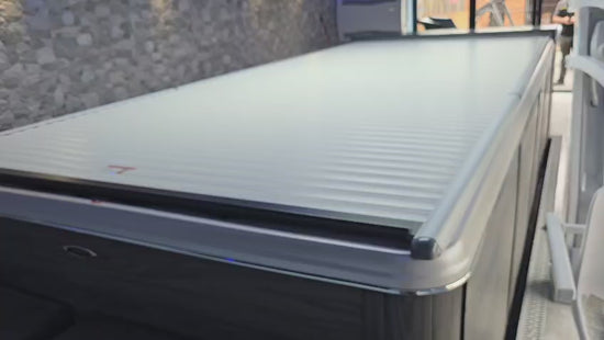 video of EZ glide automated swim spa cover opening and in use